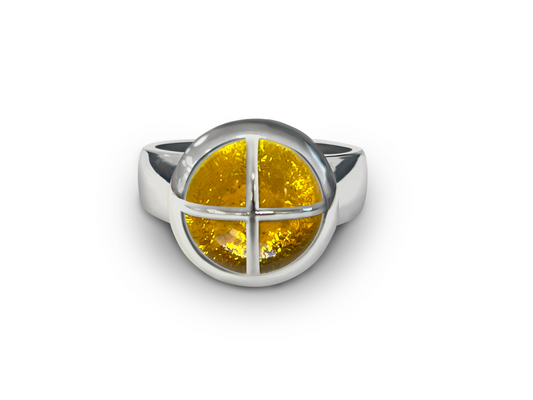 Honey Yellow ashes in glass ring with cross